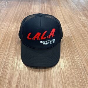 Dressed in LALA D.A.R.E. Trucker Hat